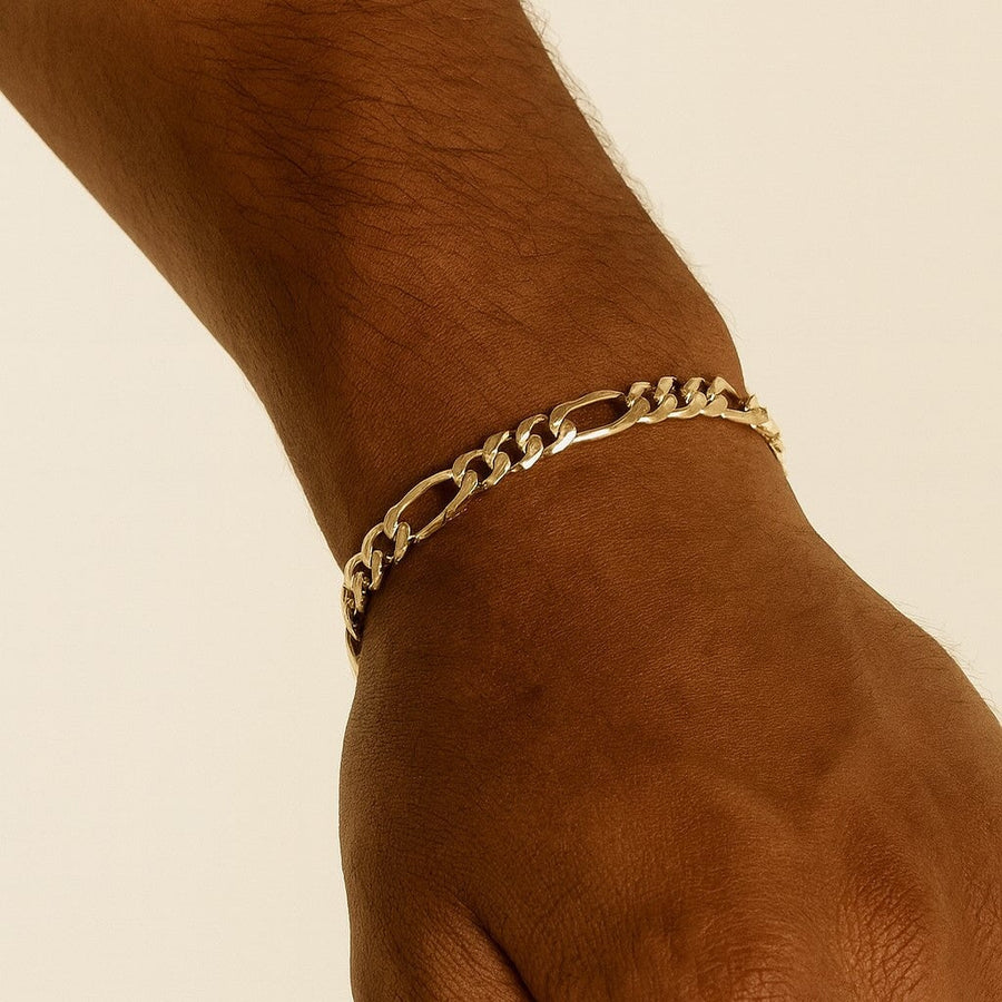 10KT Gold Figaro Bracelet Bracelet Bijoux Signé Luxo 5.6 mm Yellow 7.5"